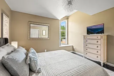 TV, dresser, and morning light — no short straw here
