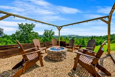 Pergola, string lights, and an easy-start gas fire pit