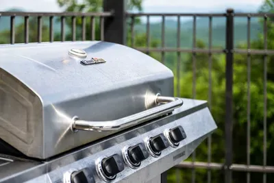 Full-size gas grill right on the deck