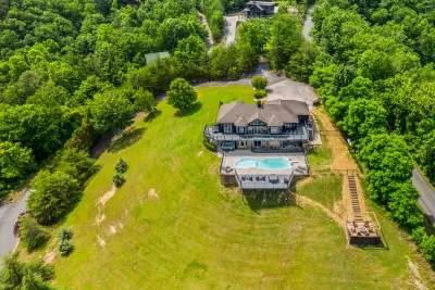 One house, one hilltop, forest in every direction
