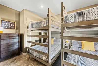 Bunk room with sturdy wood bunks and real mattresses