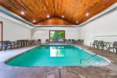 Dive into comfort, luxury, and tranquility at the indoor pool.