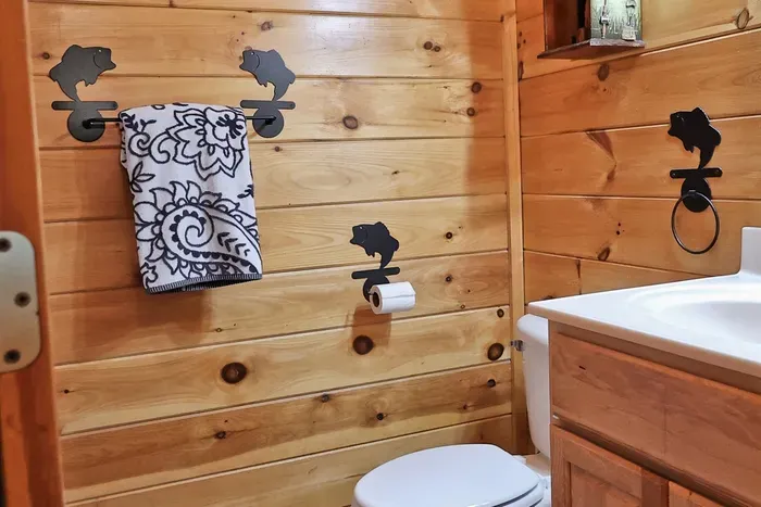 Ensuite bathroom with shower, vanity, and toilet.