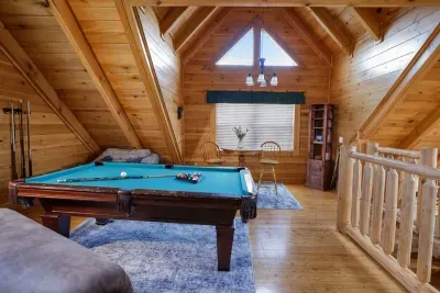 Game on! Shoot some pool upstairs, then lounge on the second-level couch