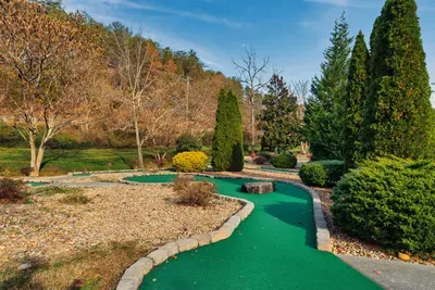 A perfect spot for a relaxing round of mini golf while enjoying the peaceful outdoor scenery.
