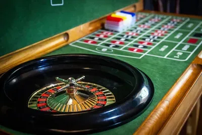 Place your bets — a real roulette wheel spins right inside the cabin. Felt-top casino action that turns an ordinary evening into your own private game-night getaway. Who's feeling lucky?