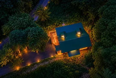 Private hot tub tucked into the treetops — soak under the open sky while the Blue Ridge forest wraps around you on every side. Yes, it's as good as it looks.