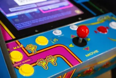 Drop a coin into nostalgia — the retro arcade cabinet brings joystick-and-button classics back to life. Tournament bragging rights included, no quarters required.
