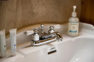 Stocked and ready at the sink — toiletries set out so you can drop your bag and settle straight in. The small comforts that make arriving feel effortless.