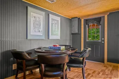 Pull up a leather chair — the dedicated card table is dealt and ready. Poker nights, game marathons, and easy conversation, with the backyard just steps through the door.
