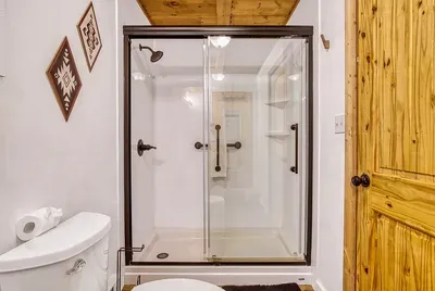 Walk-in shower with real water pressure and room to actually move. After a day on the trail, this is the first thing you'll be glad we got right.