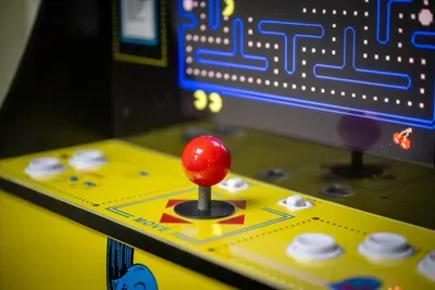 Joystick, glowing buttons, one more round. The arcade cabinet in the game room settles rainy afternoons, long car rides, and every long-standing family rivalry in the house.