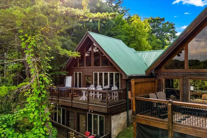 Savor every moment on our deck, where the beauty of the mountains is all around you. 😊
