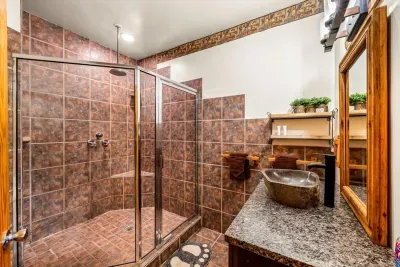 Clean and bright, this full bath is all yours for a relaxing shower.