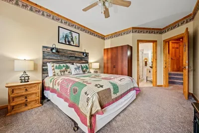 Enjoy a restful night's sleep in this quiet and private queen bedroom.
