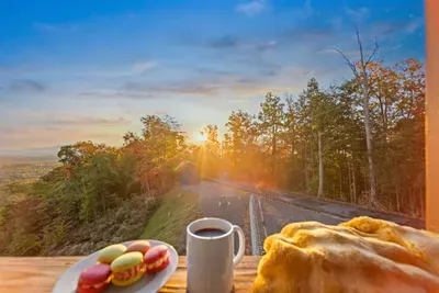 Step outside and enjoy the natural beauty surrounding the cabin.