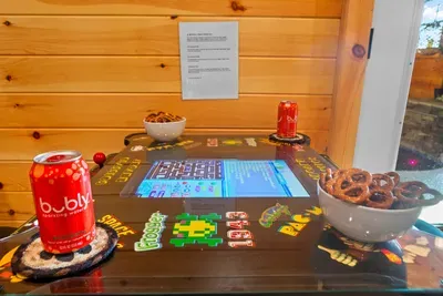 Snack in one hand, joystick in the other!