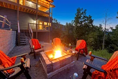 Stars above, mountains around, fire between — magic in every moment.