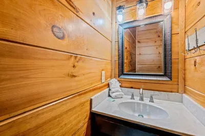 One more full bath tucked into the pine