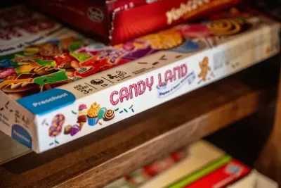 Board games stacked for the rainy afternoon