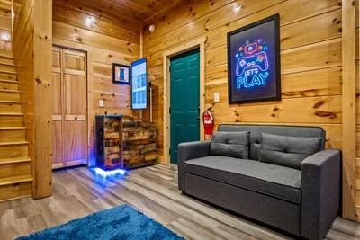 Game room off the stairs, lit up and ready