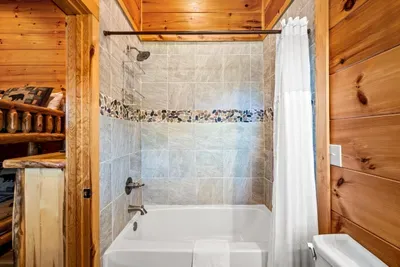 Tiled tub-shower with a bright, clean finish