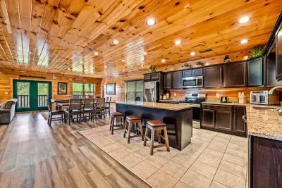 Island seating for the whole group, dining just beyond
