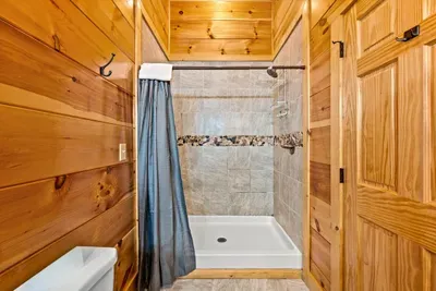 Tiled walk-in shower with plenty of elbow room