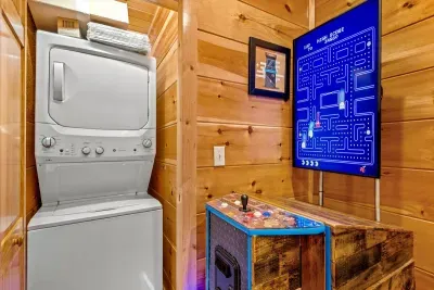 Washer and dryer right beside the arcade
