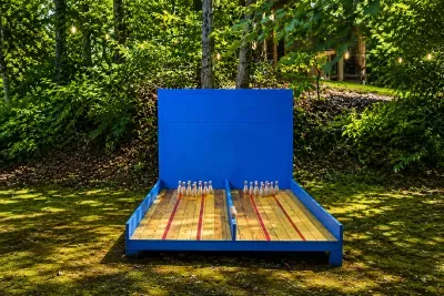 Our outdoor bowling lane is the perfect place to challenge your family and friends while enjoying the fresh mountain air. Whether you're keeping score or just having fun, it's a unique amenity that makes your stay even more memorable.