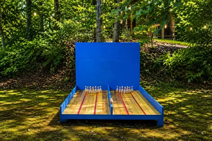 Our outdoor bowling lane is the perfect place to challenge your family and friends while enjoying the fresh mountain air. Whether you're keeping score or just having fun, it's a unique amenity that makes your stay even more memorable.
