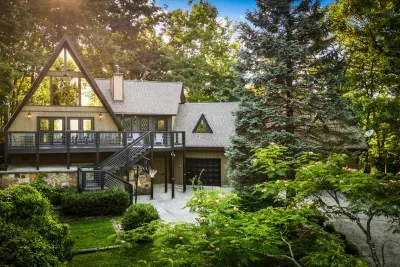 Classic A-frame framed by towering evergreens and mountain air, with wraparound decks on every level. Big enough for the whole group, tucked away enough to feel like yours.
