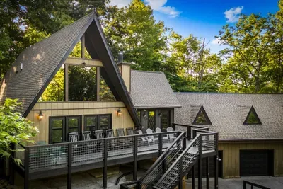 Iconic A-frame tucked into the treetops with a multi-level wraparound deck for morning coffee and stargazing nights. Room for the whole crew — the cabin you screenshot and start planning the trip around.