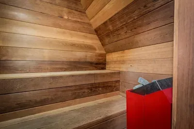 Private cedar sauna tucked right in the cabin — climb in, let the heat sink into tired muscles, and melt the trail out of your legs. A rare, restorative way to end the day.