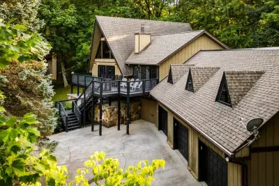 From above: a classic A-frame tucked into the trees with room to sprawl and no one for company but the forest. The kind of hideaway you plan the whole trip around.