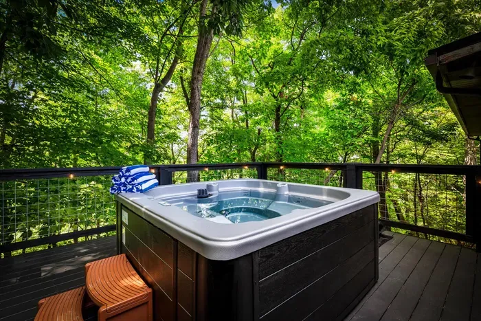 Slip into the hot tub with the forest bubbling all around and not a neighbor in sight. The easiest way to unwind after a full day out — or before it.
