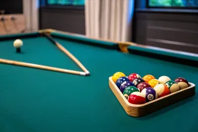 Break's set and the cues are chalked — all that's missing is your crew. The kind of easy competition that turns strangers into a team by night two.