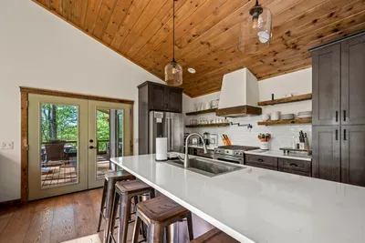 Fully equipped kitchen includes drip coffee maker.