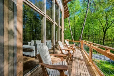 Comfortable seating on the deck in a peaceful setting!