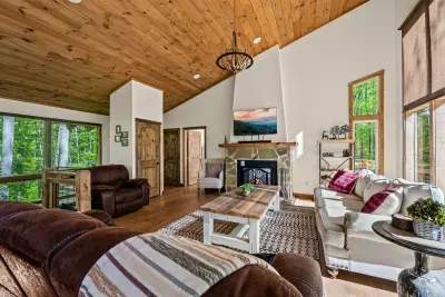 Open concept living room includes electric fire place and TV with Firestick--bring your own passwords!