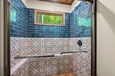 Full bathroom with shower.