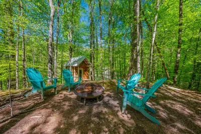 Fire pit with view of the Game Shack.