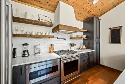 Fully equipped kitchen includes drip coffee maker.