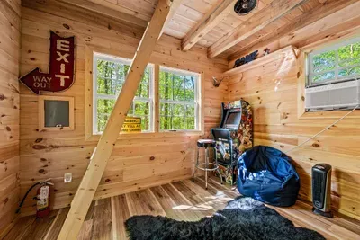 Game shack is a separate building that includes: electric heater, games, arcade, queen bed, TV--bring your own passwords and game consoles!