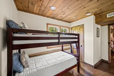 Bedroom 4 includes twin over twin bunk beds.