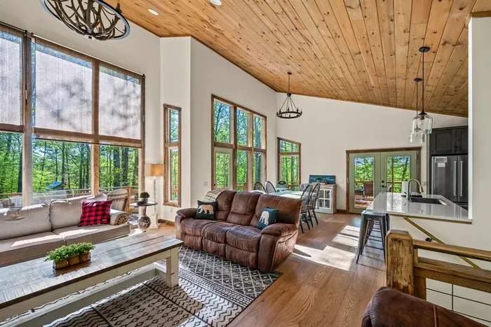 Open concept living room includes electric fireplace and TV with Firestick--bring your own passwords!