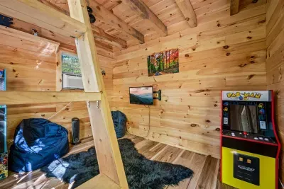 Game shack is a separate building that includes: electric heater, games, arcade, queen bed, TV--bring your own passwords and game consoles!