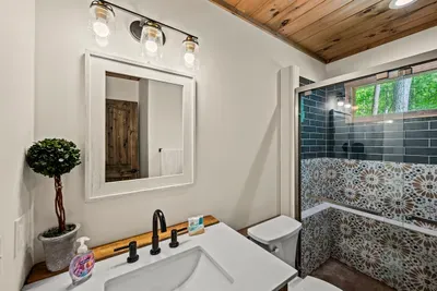Full bathroom with shower.