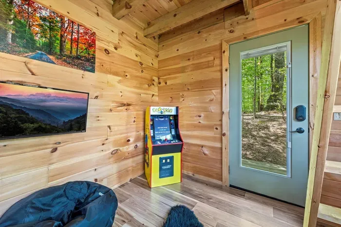 The ultimate kids’ retreat — bean bags, TV, and a retro arcade game for endless fun.