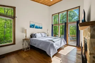 Master bedroom includes fire place, TV with Firestick (bring your own passwords), and entrance to deck.